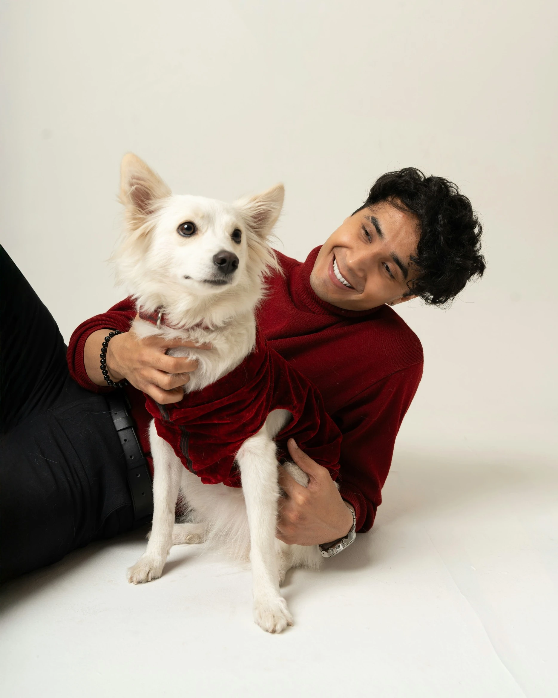 Happy Pomeranian dog with owner
